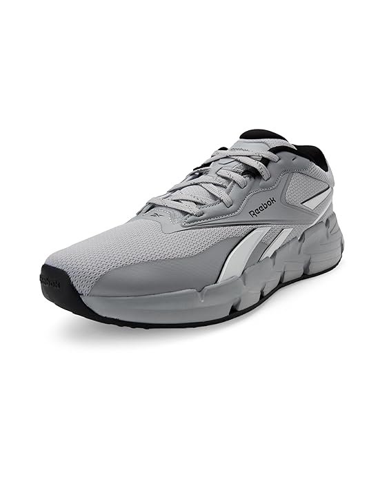 Reebok Zig Titanica Lite running shoes with lightweight cushioning, breathable mesh upper, and flexible outsole for daily running and workouts.
